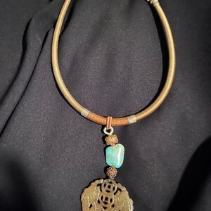 Handmade gorgeous necklace.  Purchased at a craft faire in Palm Springs.  Greens